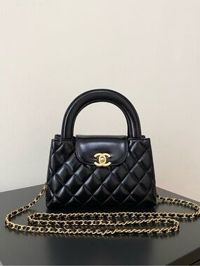 Chanel mini kelly lambskin black/gold